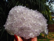 Rainbow Calcite covered by Amethyst CAL033